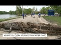 volunteers clean up sunset park and marina following severe storms flooding