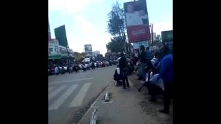 Mandago leads youth in a circumcision ritual song in Eldoret town after failed nominations exercise