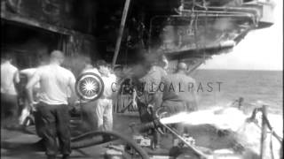 Crew of Aircraft Carrier USS Oriskany (CVA-34) successfully extinguishes fire abo...HD Stock Footage