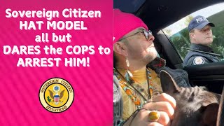 Fashion plate Sovereign Citizen refuses to budge.  “I can’t appear any more than I can DISappear!”