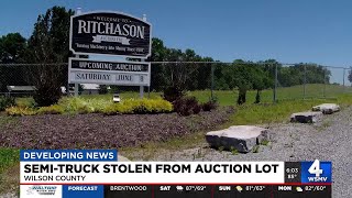 Semi-truck stolen from auction lot