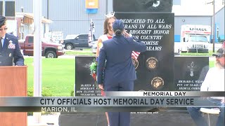 Dozens gather for Memorial day service at Rose Hill Cemetery