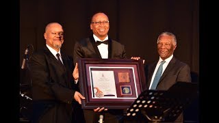 Dr Cassius Lubisi receives Unisa Chancellor's Award on behalf of President Cyril Ramaphosa