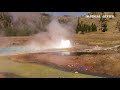 the firehole river geyser basins at yellowstone