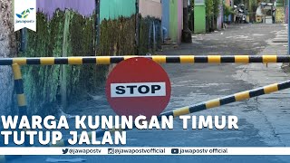 Warga Kuningan Timur Tutup Jalan