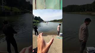 The naughty kid went into the water to catch fish again. Please do not imitate the dangerous act