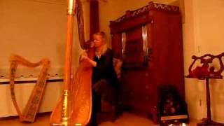 Harpist Regina plays for YouTube Symphony the Haendel Concerto 1st Mv on her harp