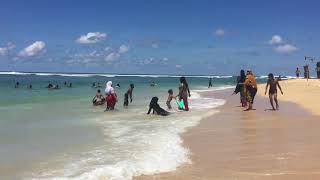 Muslim Women Enjoying the Ocean at Matara Beach in Sri Lanka