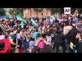 Syrian refugees in anti-Assad protest on eve of key summit on crisis