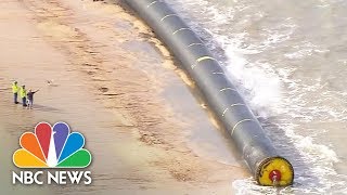 Giant Pipes Wash Up On U.K. Beaches | NBC News