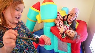 JUMP CASTLE inside our HOUSE!! inflatable bounce toy & ball pit for Adley & Niko! and hiding rocks!