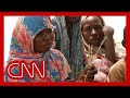 Refugee describes losing her son and brother while fleeing