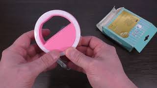 Unpacking Parcel - Round light for smartphone