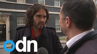 Russell Brand calls reporter 'a Snide' over house costs