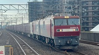 JR貨物EH500形74号機+コキ100形20B(3087レ)が古河駅2番線を通過するシーン(2024.10.27.9:28)