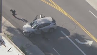 Several suspects in custody after police chase ends in crash in DTLA