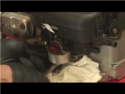 Lawn Mower Repair : How to Clean the Carburetor on a Lawn Mower Lawn Mower Repair : How to Clean the Carburetor on a Lawn Mower