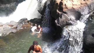 emilia and tamsin in a waterfall