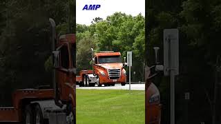 orange freightliner cascadia