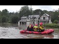 flood water at bramhall roundabout maroons people in businesses and in their houses 31 7 19