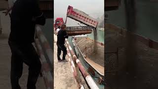 barge loading 3500 tons of soil