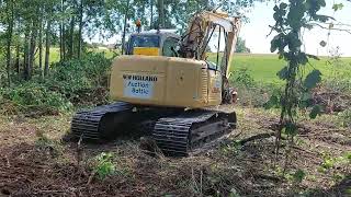 New Holland E135SR with Nisula 205E