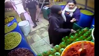 LiveLeak - Woman tries to steal an oil jug and put it between her legs