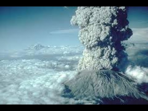 How much greenhouse gas does a volcano emit compared to humans?