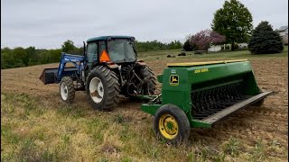 Planting Annual Sudan Grass with John Deere Grain Drill - Rotating Farm Crops with Steers