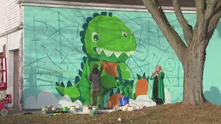 Artist paints mural in honor of 3-year-old boy killed at North Olmsted Giant Eagle