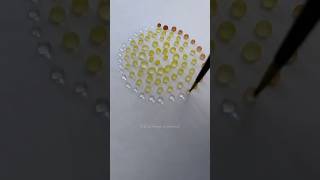 Watercolor flower - using water droplets.