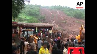 Torrential rains triggered a massive landslide that buried a remote village in western India on Wedn