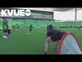 Austin FC players lead fans through a workout