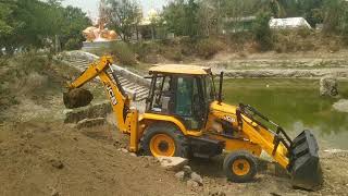 The old landing stairs of the pond were set up with a barrier with JCB