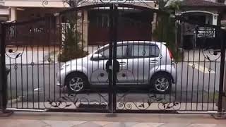 Automatic remote control outward opening swing gate