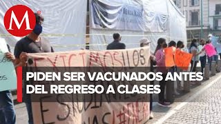 En Veracruz, estudiantes piden ser vacunados