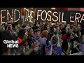 COP28: Climate advocates frustrated that draft doesn't include 'phasing out' fossil fuels