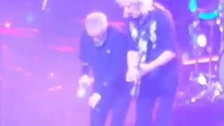 Brian May and Roger Taylor dancing