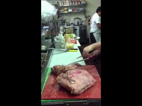 Carving a corned beef brisket for St Patricks Day. Carving a corned beef brisket for St Patricks Day.