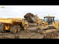 Caterpillar 963K tracked loader removing material