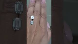 EMERALD CUT 2.74CT F VS2 on the bottom versus  -  2.87ct G VS1 on top