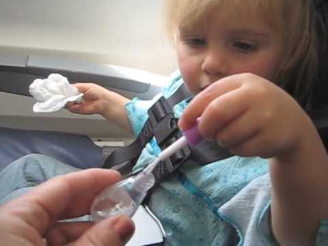 What a 2 year old does on a plane What a 2 year old does on a plane