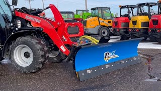 SnowFire Xtreme Front End Loader Snow Plow with Sectional Cutting Edge on Manitou Wheel Loader