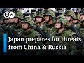 Japan unveils biggest military build-up since World War II | DW News