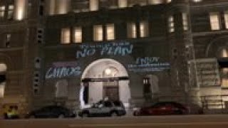 Anti-Trump messages projected on Trump hotel