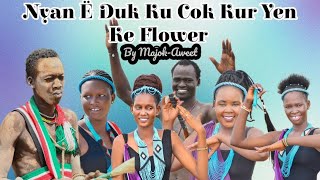 NYAN E DUK KU COK KUR YEN KE FLOWER BY ARTIST MAJOK-AWEER