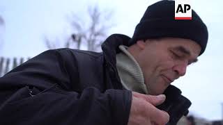 Ukraine-Russia border fence divides village