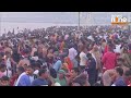 massive crowd gathers at sangam ghats for holy dip in prayagraj news9