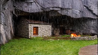 Build a warm shelter under a large rock in the rain forest, hunt and cook.