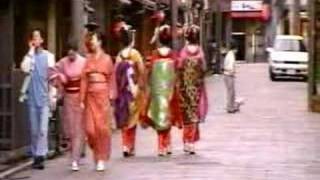 Geisha or maiko meeting in the Gion area of Kyoto, Japan